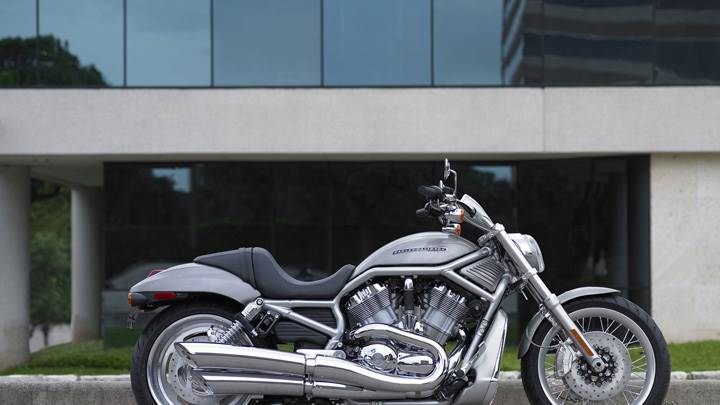 Harley Davidson Vrsca V Rod Parked Outside Building